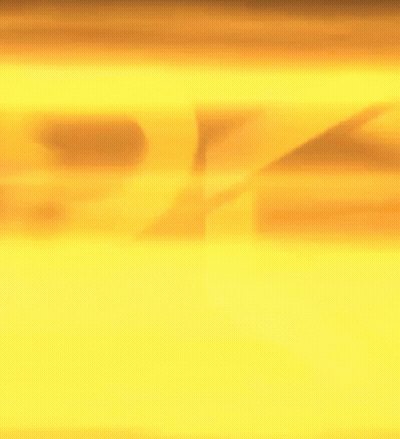 A Close Up Of A Yellow Sign That Says Pk On A Black Background . GIF