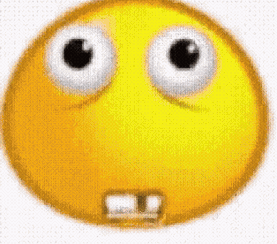 A Close Up Of A Yellow Smiley Face With Big Eyes And A Missing Tooth . GIF