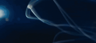 A Close Up Of A Yellow Sphere With A Lot Of Bubbles In It . GIF