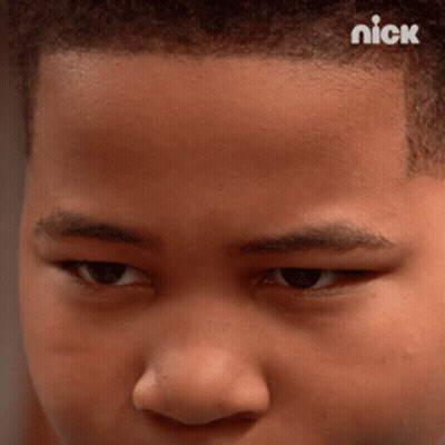 A Close Up Of A Young Boy 'S Face With The Nick Logo On The Bottom GIF
