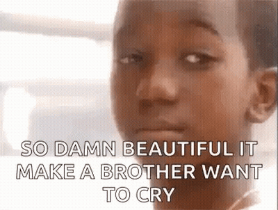 A Close Up Of A Young Boy 'S Face With The Words `` So Damn Beautiful It Make A Brother Want To Cry '' . GIF