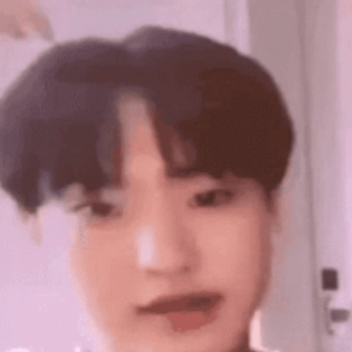 A Close Up Of A Young Man Making A Funny Face With His Tongue Out . GIF