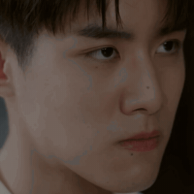 A Close Up Of A Young Man 'S Ear And Face GIF