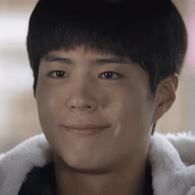 A Close Up Of A Young Man 'S Face Smiling GIF
