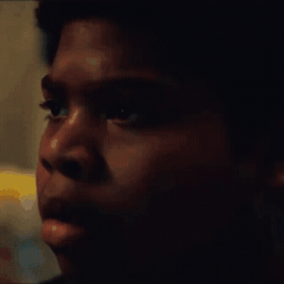 A Close Up Of A Young Man 'S Face With A Blurred Background GIF