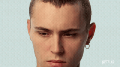 A Close Up Of A Young Man 'S Face With A Netflix Logo In The Corner GIF