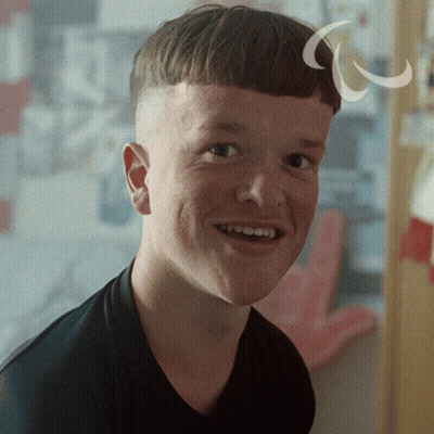 A Close Up Of A Young Man 'S Face With A White Circle Around His Head GIF