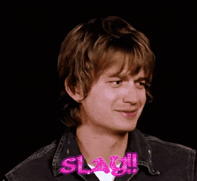 A Close Up Of A Young Man 'S Face With The Word Slay Written On His Neck . GIF