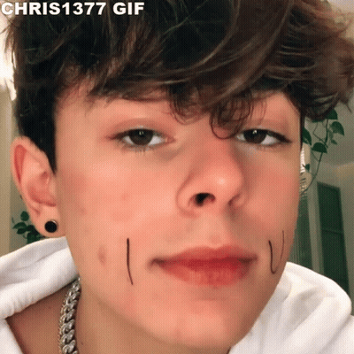A Close Up Of A Young Man 'S Face With The Words Chris1377 Gif Above It GIF