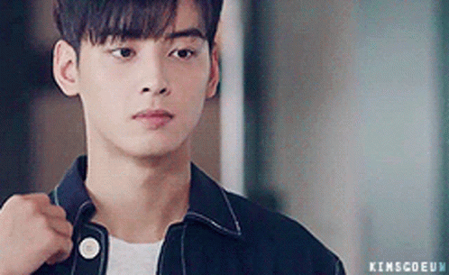 A Close Up Of A Young Man Wearing A Black Jacket . GIF