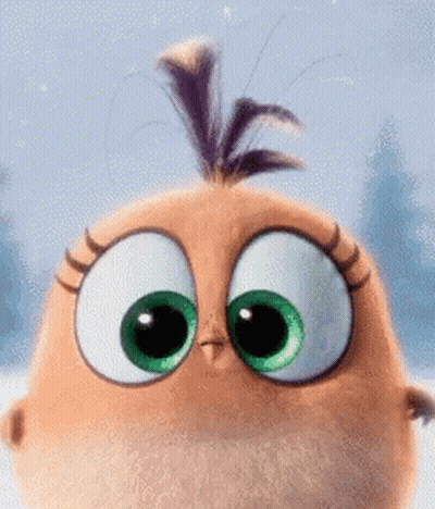 A Close Up Of An Angry Birds Character With Big Green Eyes GIF