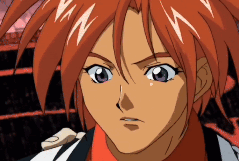 A Close Up Of An Anime Character With Red Hair And Blue Eyes GIF