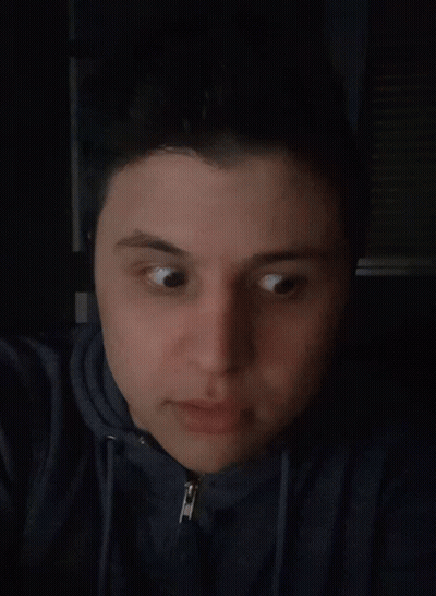 A Close Up Of An Elderly Woman 'S Face With A Black Jacket On GIF