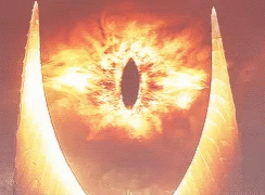 A Close Up Of An Eye With A Hole In The Middle GIF