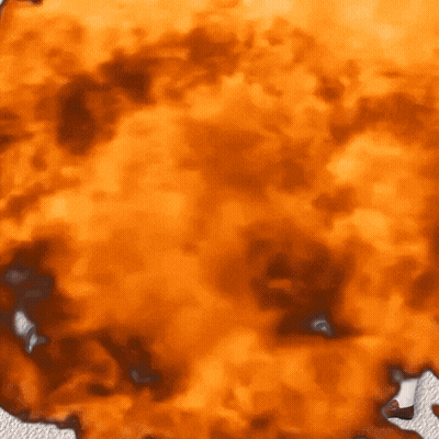 A Close Up Of An Orange Background With A Few Spots GIF
