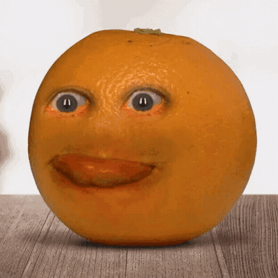 A Close Up Of An Orange With A Face On It GIF