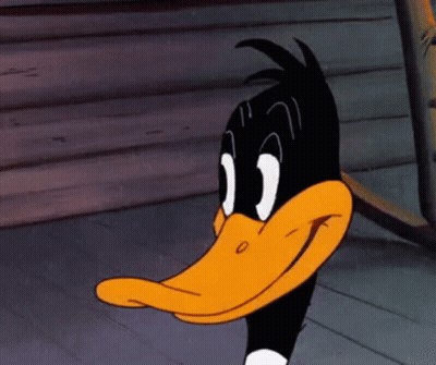 A Close Up Of Daffy Duck 'S Face With A Big Smile GIF