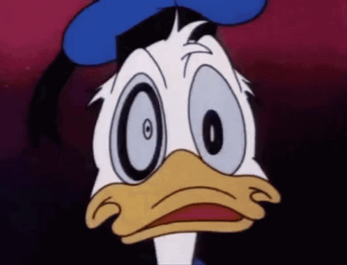 A Close Up Of Donald Duck With Big Eyes GIF