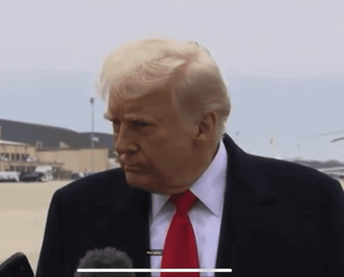 A Close Up Of Donald Trump 'S Face Is Shown On A Tablet GIF