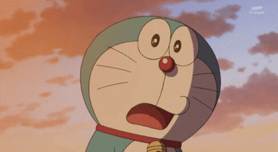 A Close Up Of Doraemon 'S Face With A Tv Asahi Logo In The Corner GIF