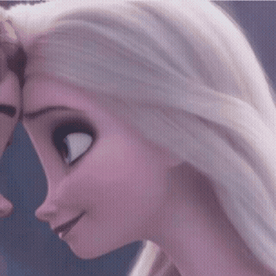 A Close Up Of Elsa 'S Face From The Movie Frozen Ii . GIF