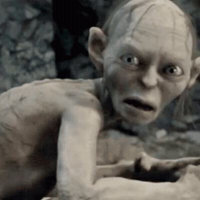 A Close Up Of Gollum From The Lord Of The Rings Making A Funny Face GIF