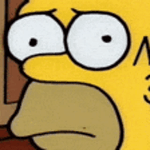 A Close Up Of Homer Simpson 'S Face With A Surprised Expression . GIF