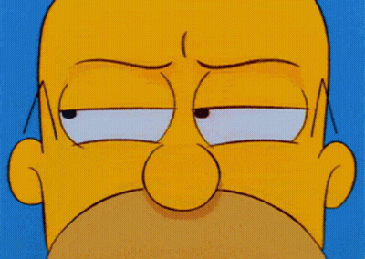 A Close Up Of Homer Simpson 'S Face With An Angry Look On His Face GIF