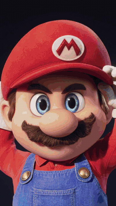 A Close Up Of Mario Wearing Overalls And A Red Hat With A M On It GIF