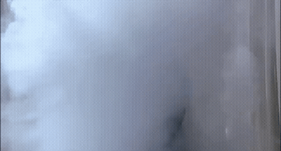 A Close Up Of Smoke Coming Out Of A Container GIF