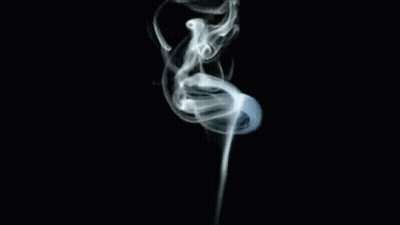 A Close Up Of Smoke Coming Out Of A Pipe On A Black Background GIF