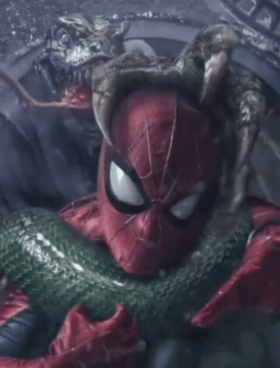 A Close Up Of Spider Man Holding A Snake In His Hands GIF