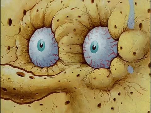 A Close Up Of Spongebob 'S Face With Holes In It And Blue Eyes GIF
