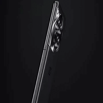 A Close Up Of The Back Of A Cell Phone Showing The Camera GIF
