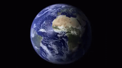 A Close Up Of The Earth Spinning In The Dark GIF