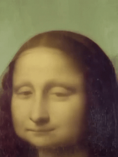 A Close Up Of The Face Of A Woman With Her Eyes Closed . GIF