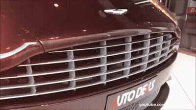 A Close Up Of The Front Of A Car With A License Plate That Says Uto Deus GIF