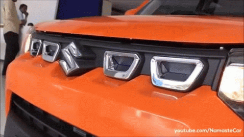 A Close Up Of The Front Of A Suzuki Vehicle GIF
