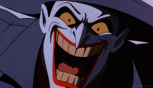 A Close Up Of The Joker 'S Face With A Gifmovie Tumblr.com Watermark GIF