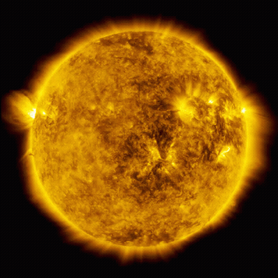 A Close Up Of The Sun With A Dark Background GIF