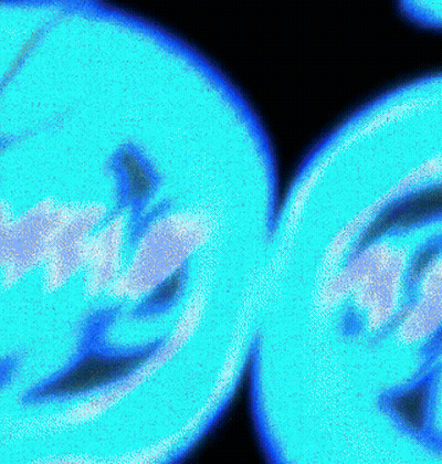 A Close Up Of Two Blue Circles On A Black Background That Looks Like A Smiley Face GIF