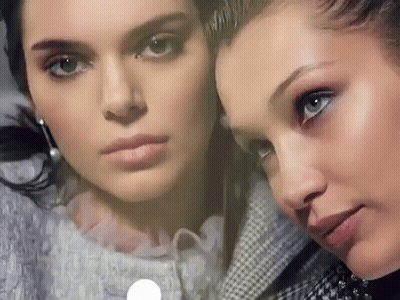 A Close Up Of Two Women 'S Faces With Their Eyes Closed . GIF