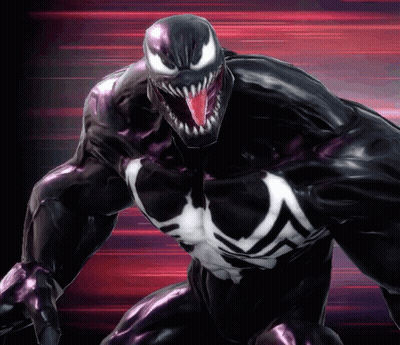 A Close Up Of Venom With His Mouth Open And Tongue Hanging Out GIF