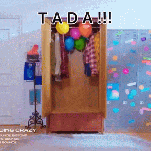 A Closet Filled With Clothes And Balloons With The Words " Ta Da " Written On It GIF