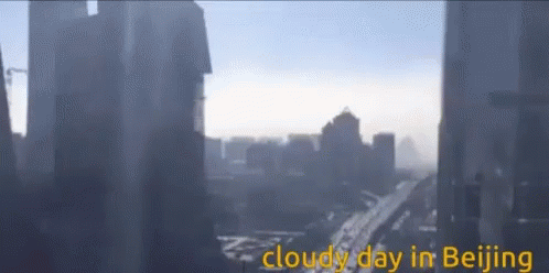 A Cloudy Day In Beijing Is Shown In A Blurry Photo GIF