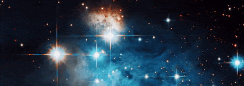 A Cluster Of Stars Surrounded By A Blue Background GIF