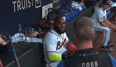 A Cobb Police Officer Talks To A Baseball Player GIF