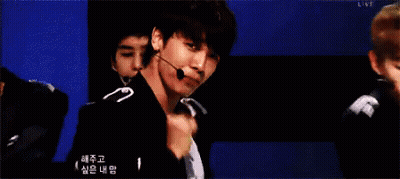A Collage Of Three Pictures Of A Man With Korean Writing On The Bottom GIF