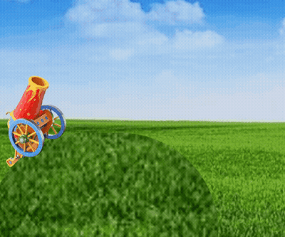 A Colorful Cannon Is Sitting In The Middle Of A Green Field GIF