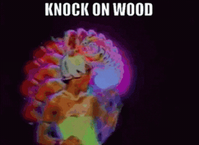 A Colorful Image With The Words Knock On Wood Written On It GIF